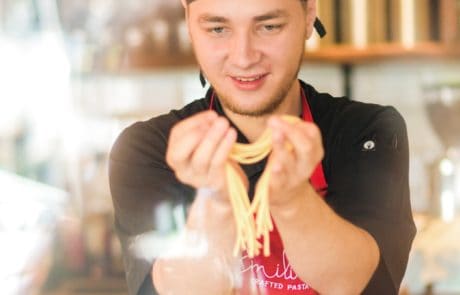 Chef making fresh pasta Italian restaurant St. Katharine Docks