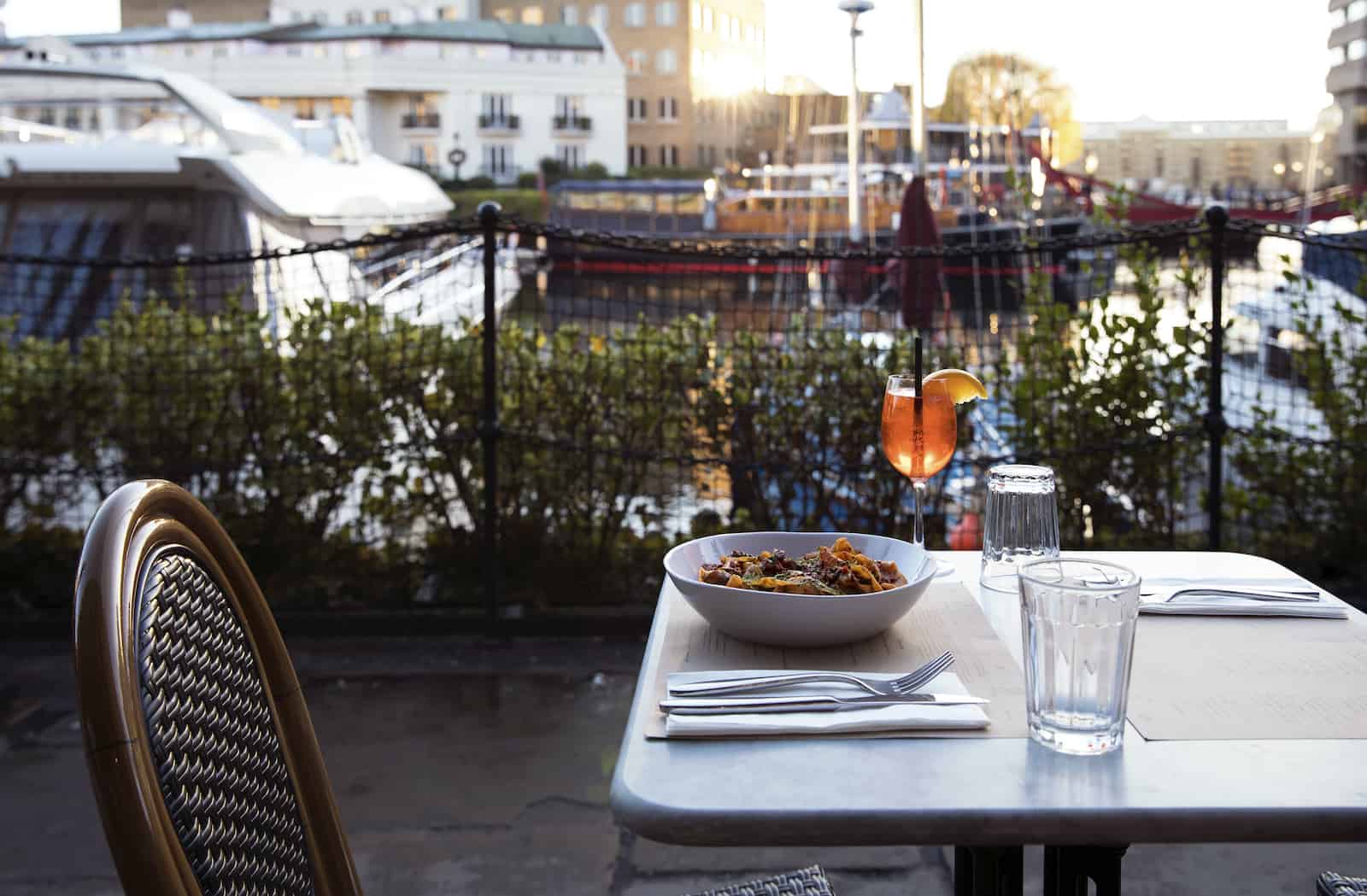 Fresh pasta restaurant St. Katharine Docks with terrace outdoor seating Aperol Spritz Bolognese pasta